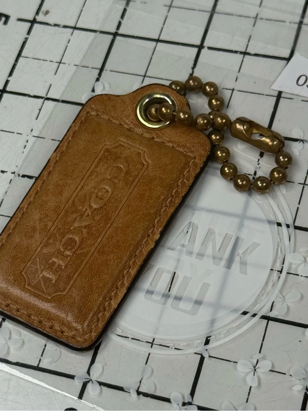 COACH Tan Leather Key Tag hang tag with Brass Ball Chain. Lg. 3 by 1.25 inches